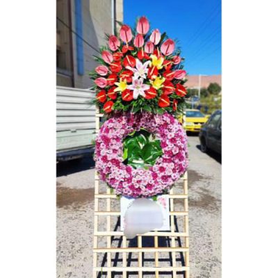 تاج گل ایستاده برای مراسم افتتاحیه در بلوار فردوس 384