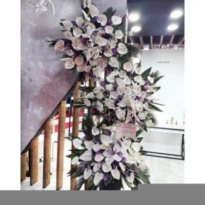 تاج گل ویژه افتتاحیه فعالیت‌های اجتماعی 1874