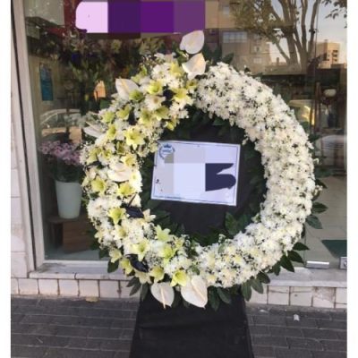 تاج گل ایستاده برای مراسم ترحیم در مسجد جامع شهرک غرب 147