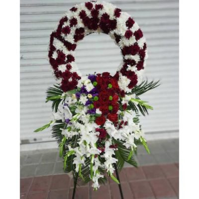 تاج گل چهار طبقه برای مراسم خاکسپاری در آرامستان بهشت زهرا 560