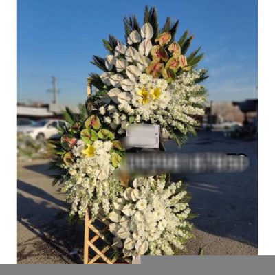 تاج گل چهار طبقه برای مراسم خاکسپاری در بهشت زهرا 576