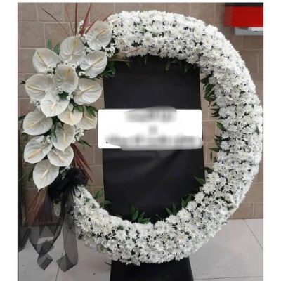 تاج گل چهار طبقه برای مراسم خاکسپاری در آرامستان امامزاده صالح 631