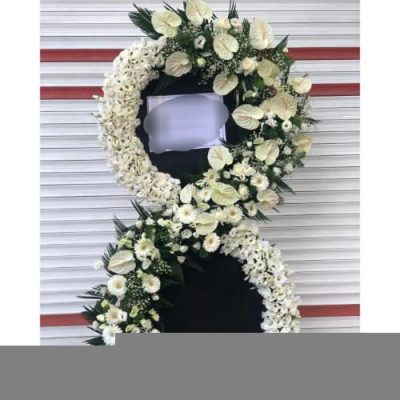 تاج گل یک طبقه برای مراسم یادبود در مسجد امام جعفر صادق خیابان جردن 691
