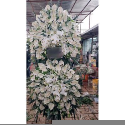 تاج گل چهار طبقه برای مراسم خاکسپاری در آرامستان امامزاده طاهر کرج 735