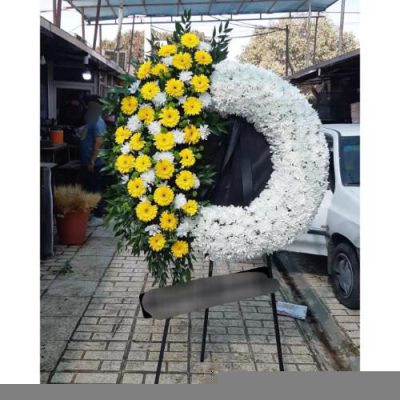 تاج گل ایستاده برای مراسم افتتاحیه در خیابان تهرانپارس 914