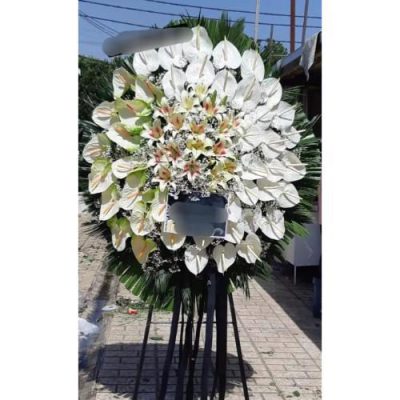 تاج گل ایستاده برای مراسم افتتاحیه دفتر کار در خیابان نیاوران 926