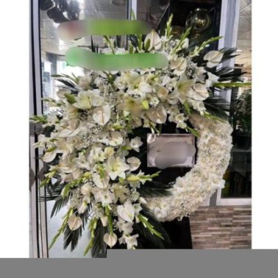 تاج گل چهار طبقه برای مراسم خاکسپاری در بهشت زهرا 1562