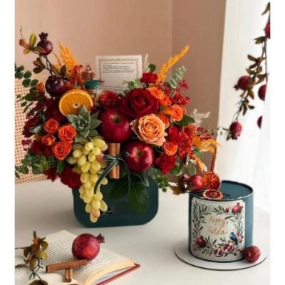سبد گل شب یلدا با گل داودی و میوه‌های تازه 4853