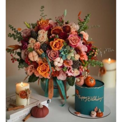 سبد گل شب یلدا با گل‌های شاداب و آجیل 4861